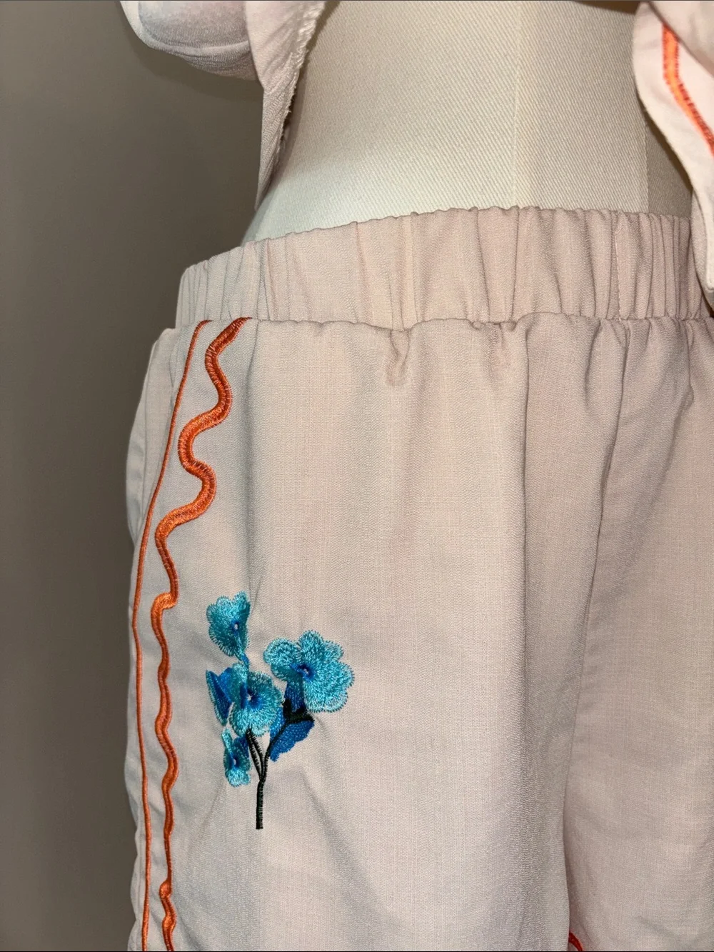 Embroidered Cream Sleeveless Two-Piece Set with Orange Trim